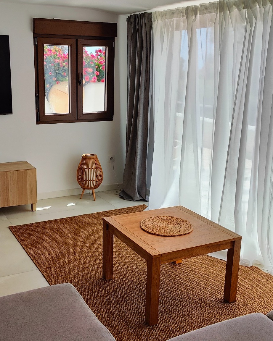 Living room with TV in Tenerife Golf & Ocean Apartment